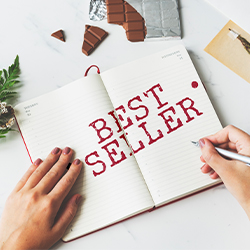 cahier avec Best Seller écrit dessus